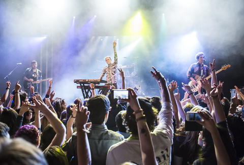 A Rocking singer performing on the stage.